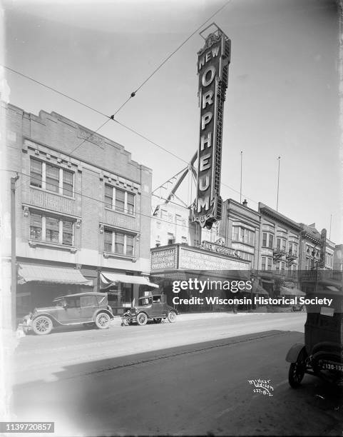 The Orpheum Theatre, 216 State Street, Madison, Wisconsin, April 10, 1927. The view also includes Weber's Restaurant, the Family Shoe Store,...