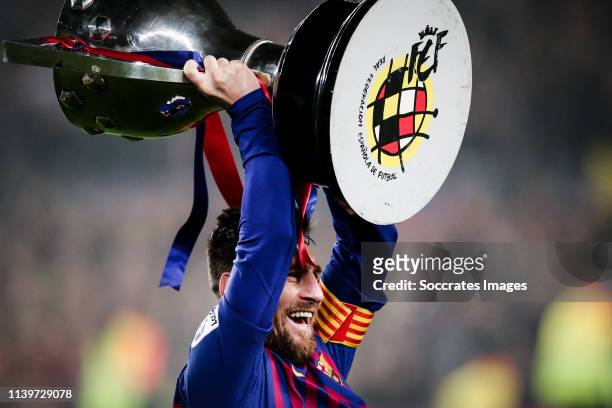 Lionel Messi of FC Barcelona, celebrate the Championship with the trophy during the Spanish Copa del Rey match between FC Barcelona v Levante at the...