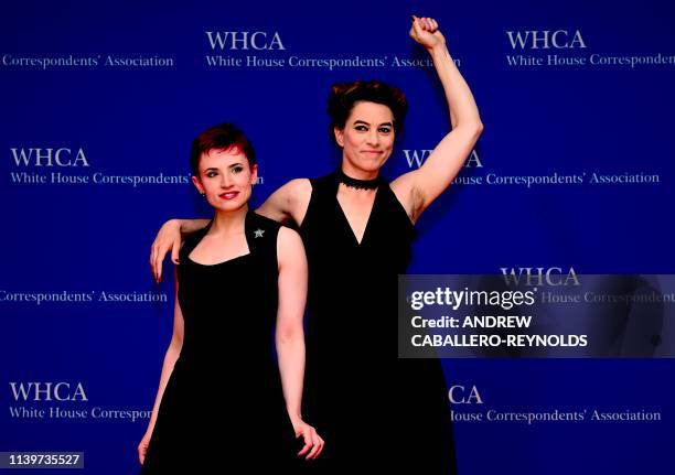 Singer Amanda Palmer and English screenwriter Laurie Penny arrive on the red carpet during the White House Correspondents' Dinner in Washington, DC...