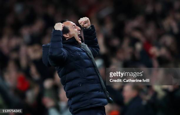 Unai Emery, Manager of Arsenal celebrates as Aaron Ramsey of Arsenal scores his team's first goal during the Premier League match between Arsenal FC...