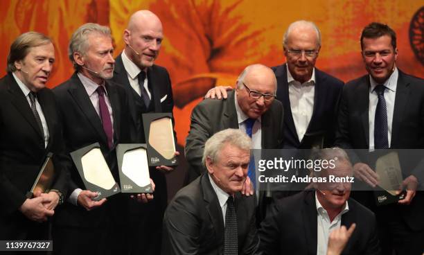 Guenter Netzer, Paul Breitner, Matthias Sammer, Uwe Seeler, Franz Beckenbauer, Lothar Matthaeus, Sepp Maier and Andreas Brehme are seen on stage the...