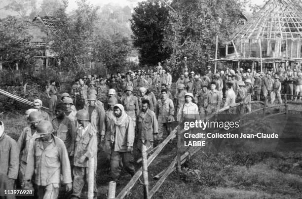 Archives: Dien Bien Phu Battle In Dien Bien Phu, Vietnam In May, 1954-Vietminh troops taking prisoners away after the victory.