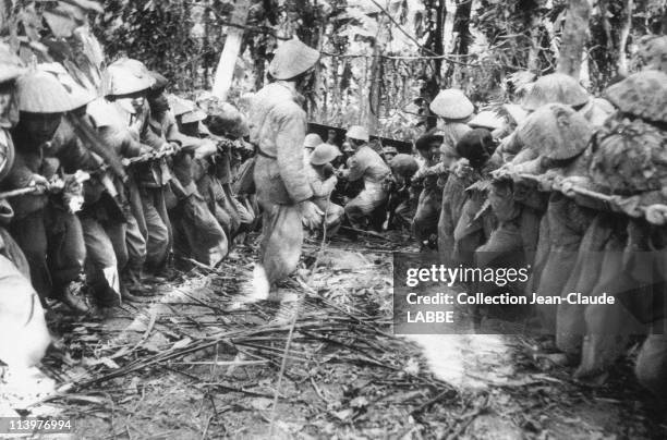 Archives: Dien Bien Phu Battle In Dien Bien Phu, Vietnam In May, 1954-Artillery pieces being moved to Dien Bien Phu.