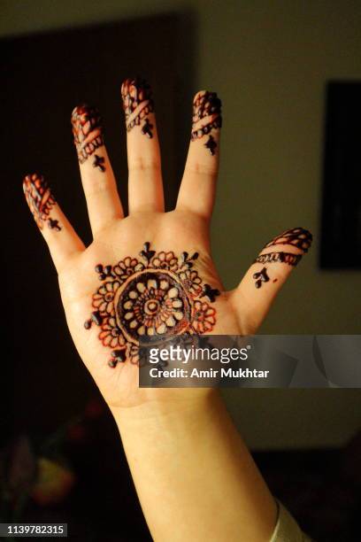Henna Designs For Kids Photos and Premium High Res Pictures - Getty Images