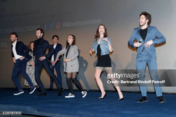 Actors Amaury de Crayencour, Benjamin Lavernhe, Camille Lellouche, Josephine Japy and Francois Civil dance during the "Mon Inconnue" Paris Premiere...