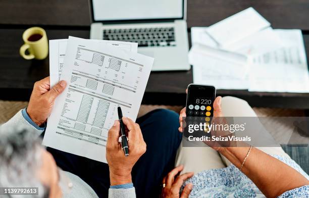 we need to make all our numbers balance - senior financial planning stock pictures, royalty-free photos & images