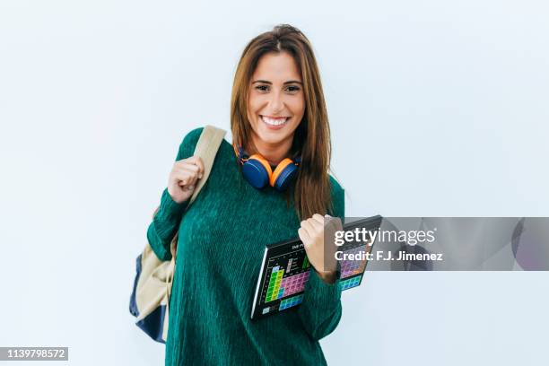 portrait of woman with notebook looking at camera. - studentessa di scuola secondaria foto e immagini stock