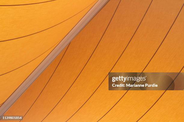 yellow shade sail - shade sail stock pictures, royalty-free photos & images