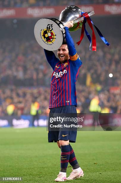 Lionel Messi of Barcelona celebrates after Barcelona won their 26th league title at the end of the Spanish League football match between Barcelona...