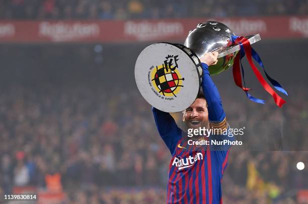 Lionel Messi of Barcelona celebrates after Barcelona won their 26th league title at the end of the Spanish League football match between Barcelona...