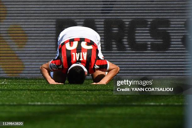 Nice's Algerian defender Youcef Atal celebrates after scoring during the French L1 football match between OGC Nice and En Avant Guingamp at the...