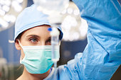 Female anesthesiologist during hard operation