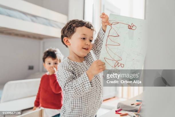 boys drawing at home - kids in bunk bed stock pictures, royalty-free photos & images