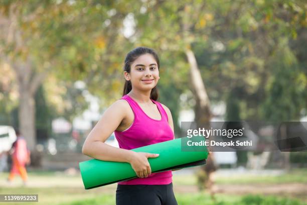 teenager girl - stock images - yoga teen stock pictures, royalty-free photos & images
