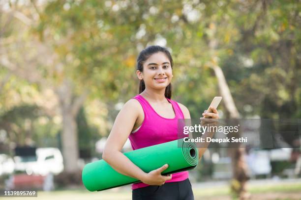 teenager girl - stock images - girl yoga stock pictures, royalty-free photos & images