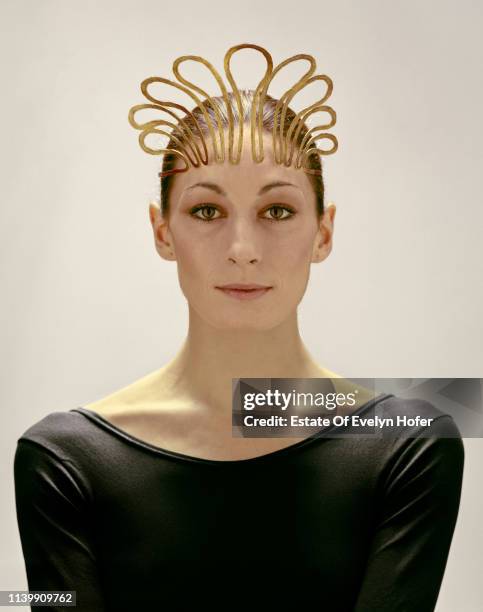 Portrait of American fashion model Anjelica Houston as she poses in a tiara , New York, 1976.