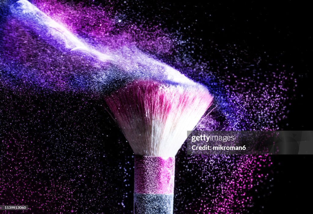 Powder blowing from makeup brushes