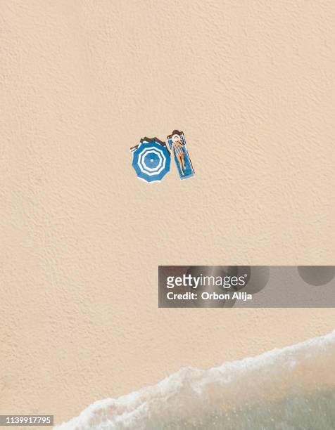 aerial view of the beach - sunshade stock pictures, royalty-free photos & images