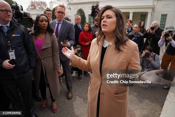 White House Press Secretary Sarah Huckabee Sanders talks to journalists outside the West Wing of the White House April 02, 2019 in Washington, DC....