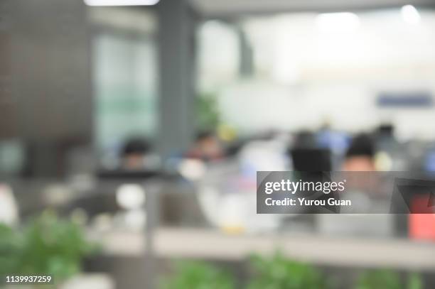 defocus effect of modern business office background,zhongshan,guangdong,china. - bokeh background - fotografias e filmes do acervo