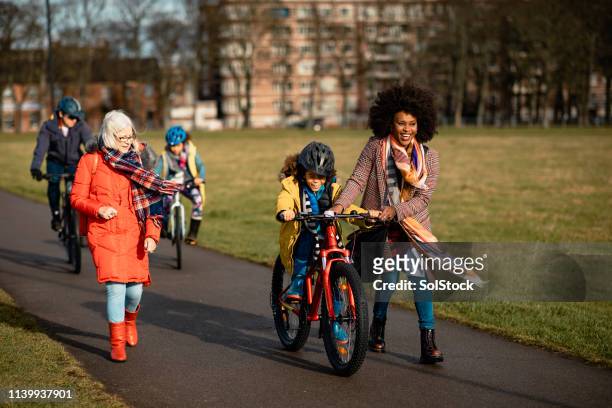 riding through the park - british culture walking stock pictures, royalty-free photos & images