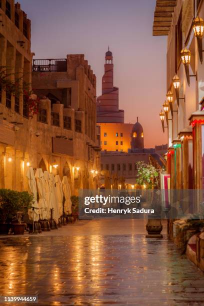 souq waqif in doha - doha street stock pictures, royalty-free photos & images