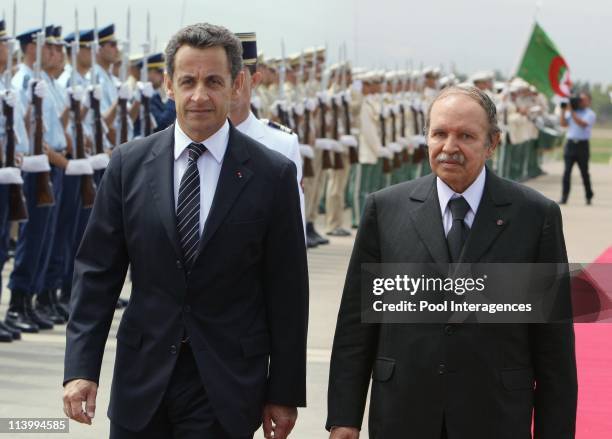 Nicolas Sarkozy with Abdelaziz Bouteflika In Algiers, Algeria On July 10, 2007-French President Nicolas Sarkozy is greeted by his Algerian...