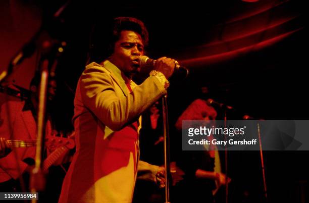 American Soul and R&B singer James Brown performs on stage at My Father's Place, Roslyn, New York, May 25, 1980.
