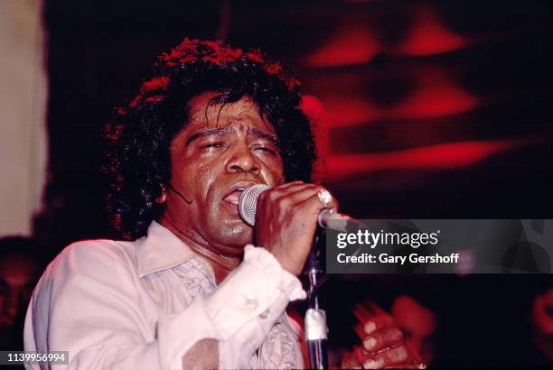 American Soul and R&B singer James Brown performs on stage at My Father's Place, Roslyn, New York, May 25, 1980.