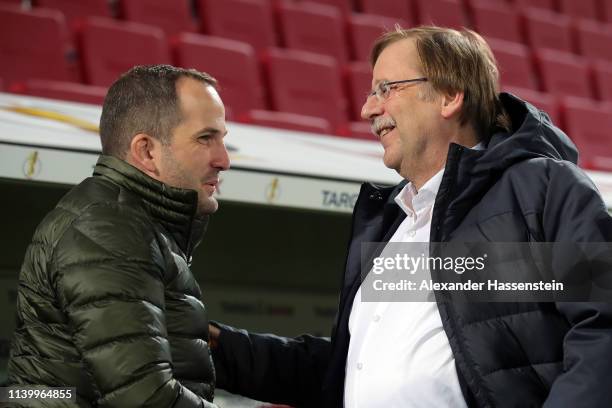 Manuel Baum Head Coach of FC Augsburg talks to Rainer Koch den Vize President of the DFB Cup prior to the match between FC Augsburg and RB Leipzig at...