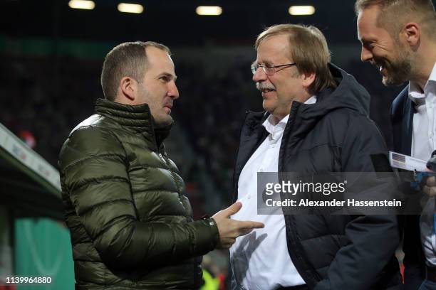 Manuel Baum Head Coach of FC Augsburg talks to Rainer Koch den Vize President of the DFB Cup prior to the match between FC Augsburg and RB Leipzig at...