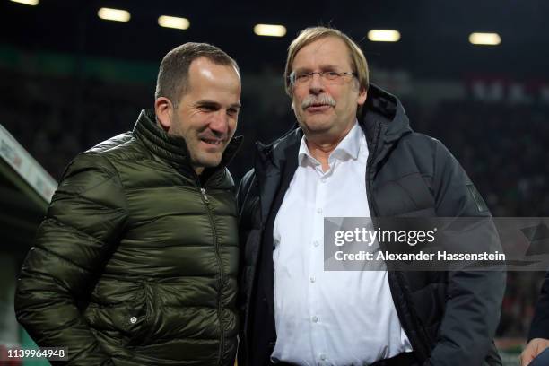 Manuel Baum Head Coach of FC Augsburg talks to Rainer Koch den Vize President of the DFB Cup prior to the match between FC Augsburg and RB Leipzig at...