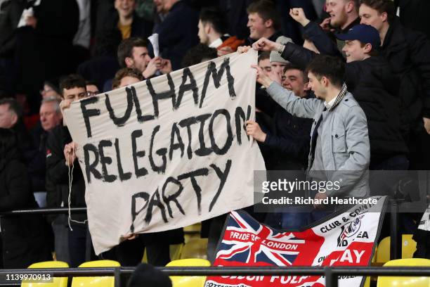 Fulham fans display a banner 'celebrating' their impending relegation during the Premier League match between Watford FC and Fulham FC at Vicarage...