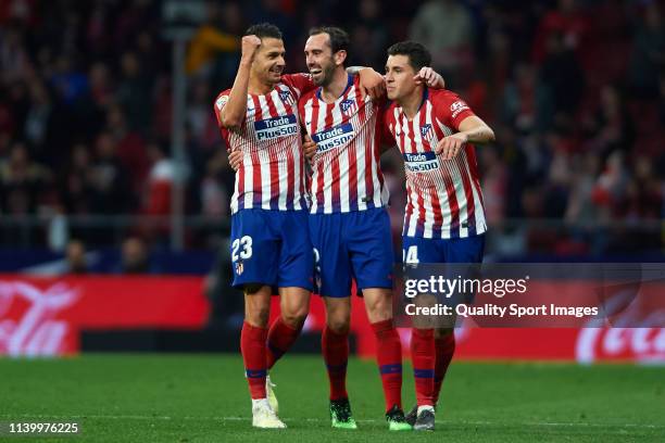 Diego Godin of Atletico de Madrid celebrates after scoring his team's first goal with his teammates Vitolo Machin and Jose Maria Gimenez during the...