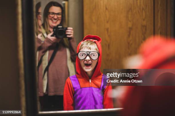 Boy wearing silly glasses