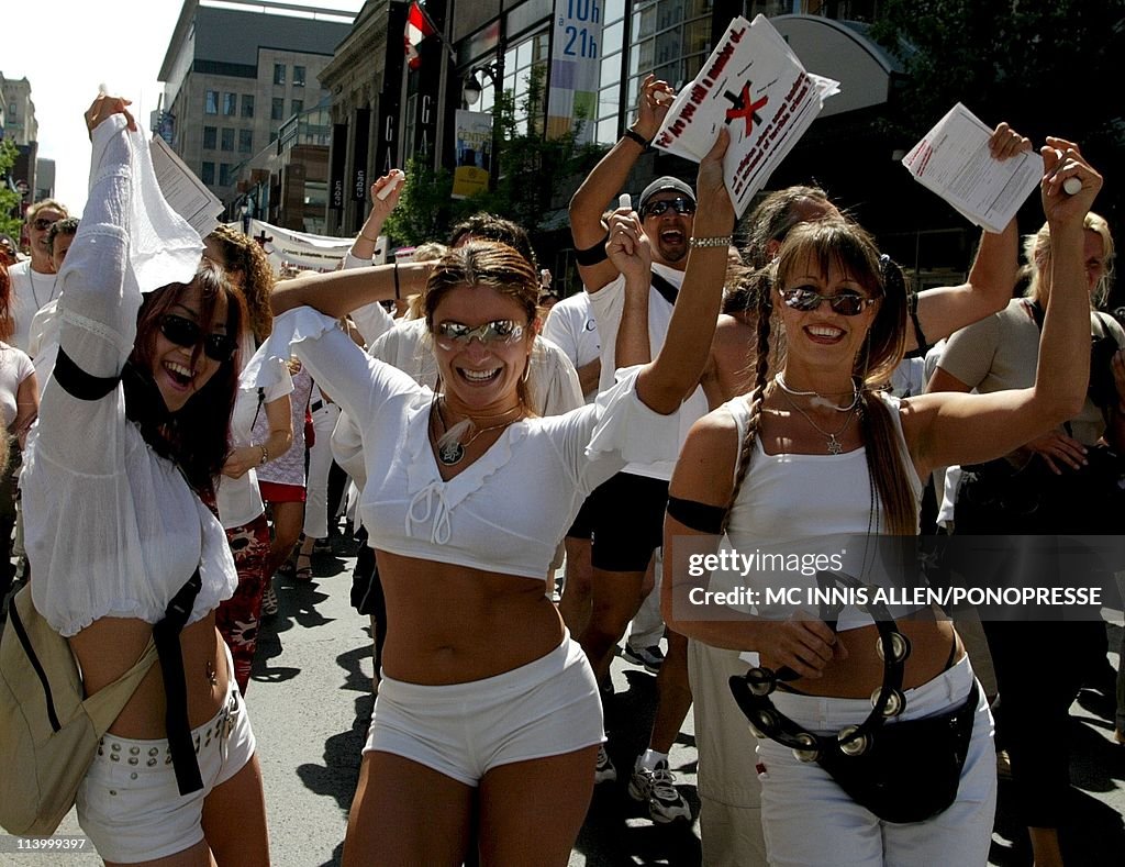 Members of the Raelian Cult march in street parade In Montreal, Canada On July 26, 2002-