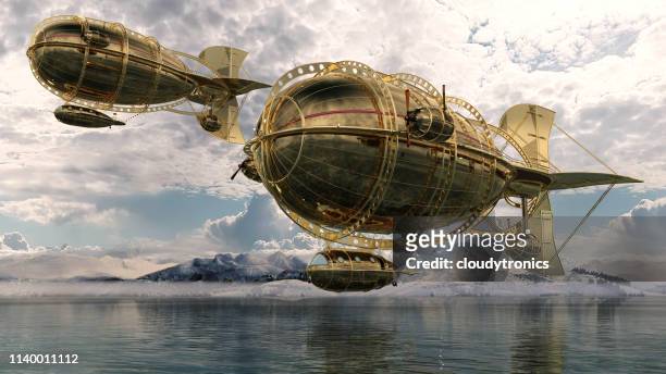 golden airship and aircraft - blimp stock pictures, royalty-free photos & images