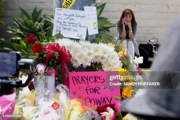 Make-shift memorial sits across the street from the Chabad of Poway Synagogue on Sunday, April 28, 2019 in Poway, California, one day after a teenage...