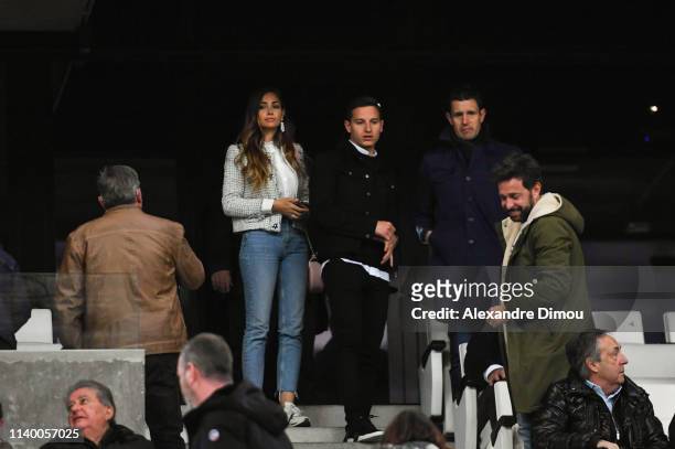 Florian Thauvin of Marseille with his wags Charlotte Pirroni during the Ligue 1 match between Marseille and Nantes at Stade Velodrome on April 28,...
