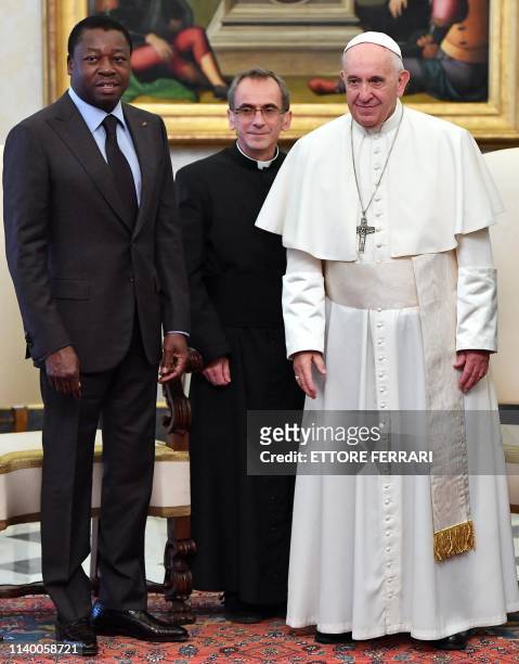 Pope Francis poses with Togo's President Faure Essozimna Gnassingbe Eyadema at the end of their private meeting at the Vatican on April 29, 2019.