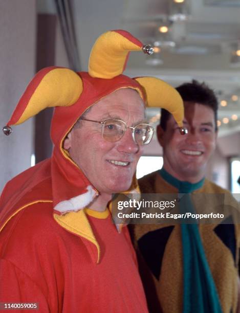 England tour manager MJK Smith with England cricketer Graeme Hick in fancy dress for the England team's Christmas lunch in Melbourne, Australia, 25th...