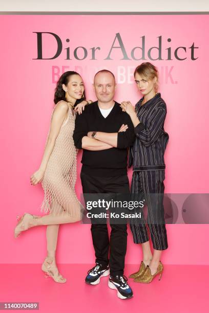 Cara Delevingne, Peter Philips and Kiko Mizuhara pose for photographs during the Dior Addict Stellar Shine launch on April 2, 2019 in Tokyo, Japan.