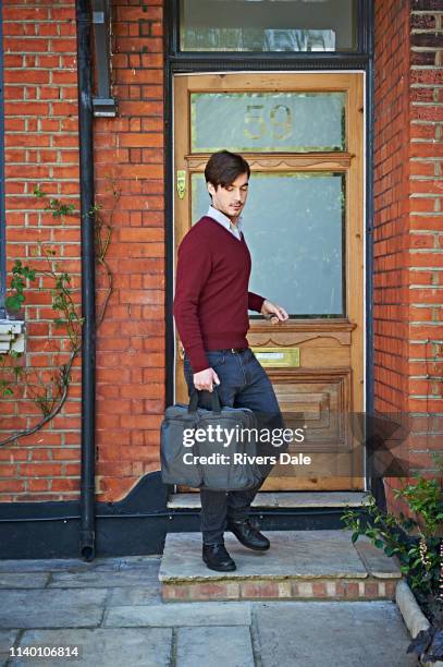 Man Rushing Out A Door 45 Stepping Through Front Door Stock Photos, High-Res Pictures, and ...
