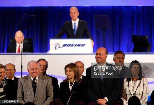 Boeing's Chairman, President and CEO Dennis Muilenburg introduces Boeing's Board of Directors during their annual shareholders meeting at the Field...