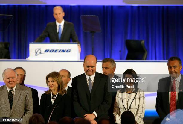 Boeing's Chairman, President and CEO Dennis Muilenburg introduces Boeing's Board of Directors during their annual shareholders meeting at the Field...