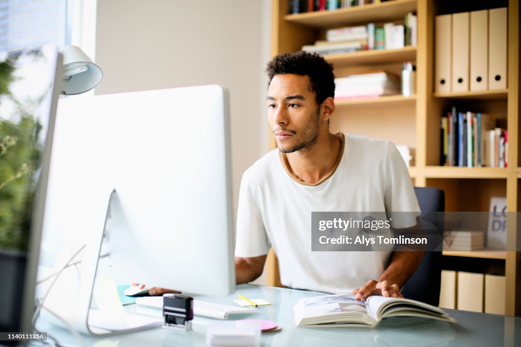 Computer At Work Graphics Graphic Designer Using Computer At Work High-Res Stock Photo - Getty Images