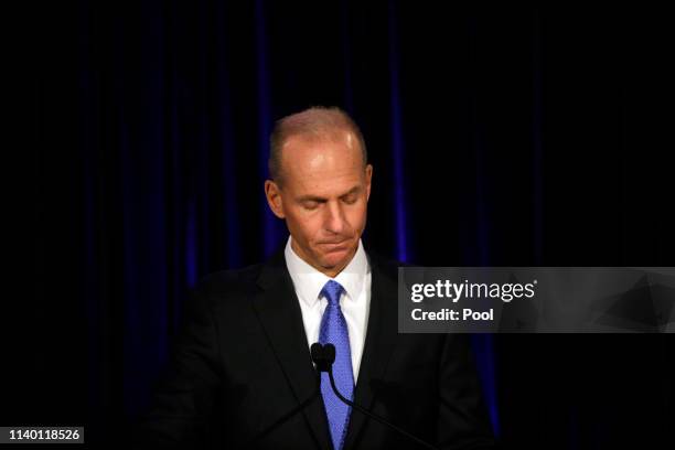 Boeing's Chairman, President and CEO Dennis Muilenburg speaks during a news conference after Boeing's Annual Meeting of Shareholders at the Field...