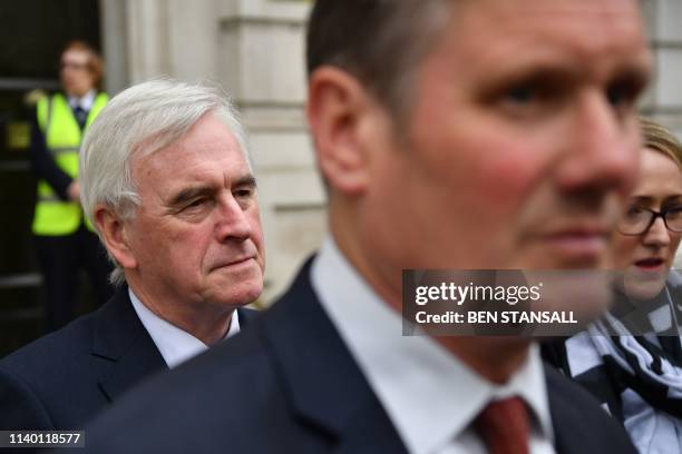 Labour's Brexit spokesman Keir Starmer and Labour's shadow chancellor John McDonnell leave the Cabinet office afterBrexit talks with the Conservative...