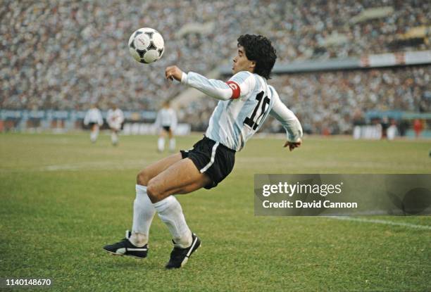 Argentina player Diego Maradona in action during a 1986 FIFA World Cup qualifying match against Peru at the National Stadium on June 23, 1985 in...