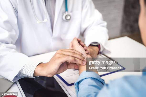 Doctor checking health primary of male patient for consultation health in hospital health. health and doctor concept.